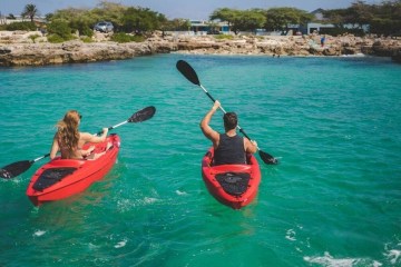 Two people on kayaks.